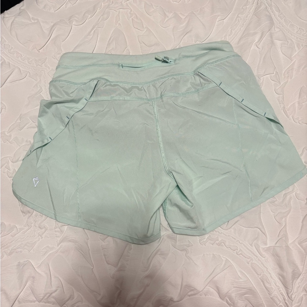 Size 12 teal ivivva shorts